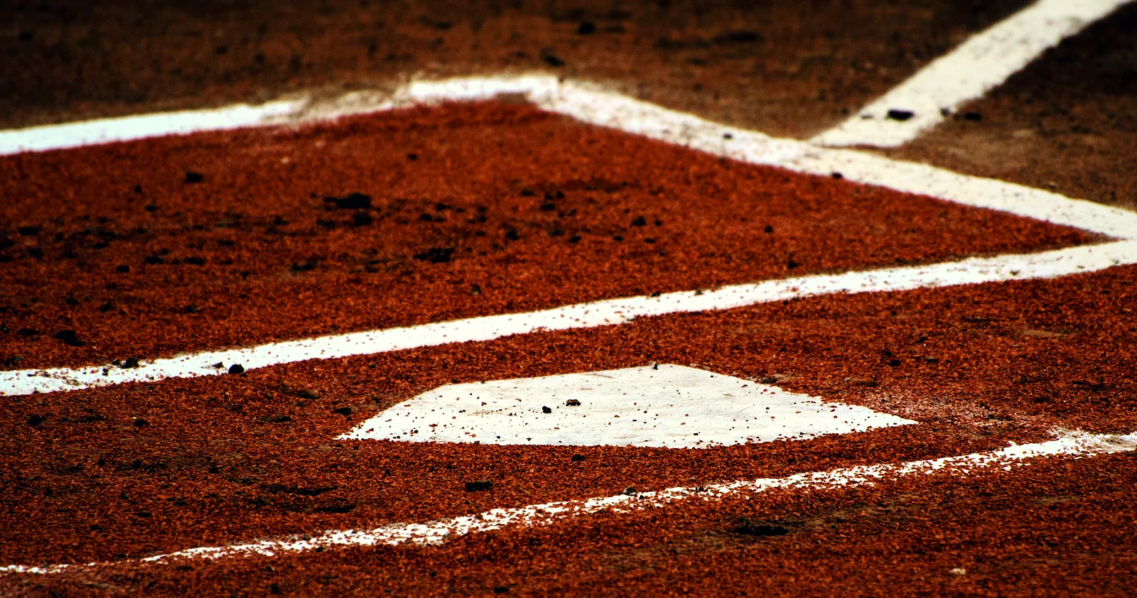 Clay and chalk at home plate.