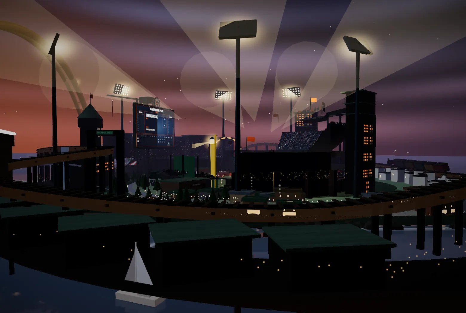 Harbor Park at dusk: the ballpark lights over the harbor, its docks and the Harbor Line.